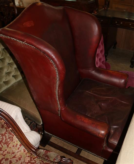 Leather-covered wing armchair